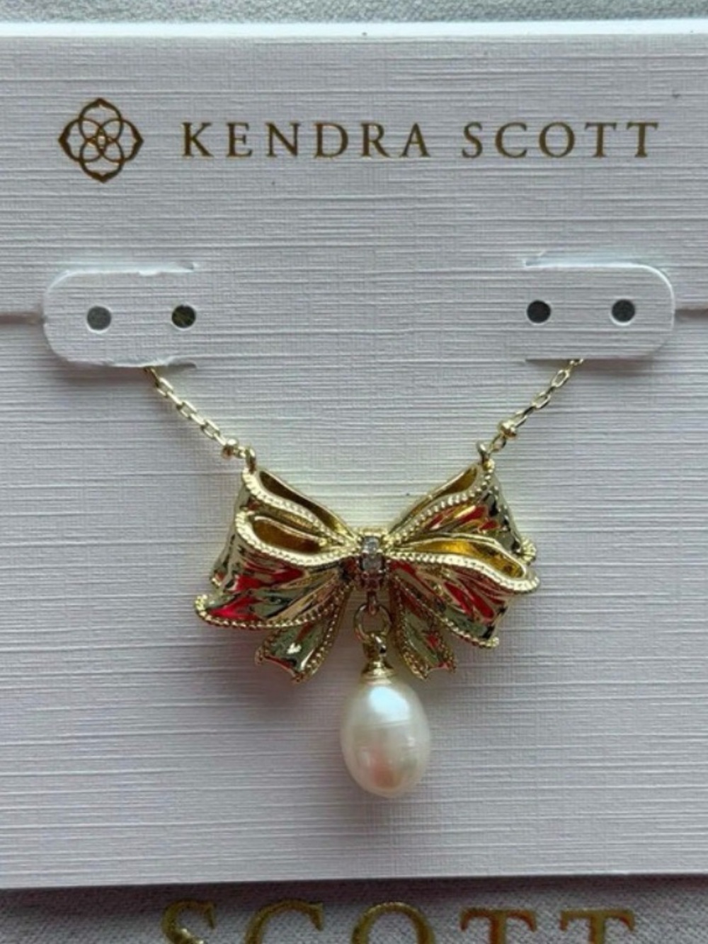 Kendra Scott Gold Bow Necklace with Pearl Drop and Pink Accents